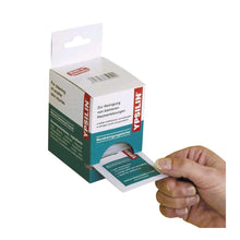 YPSILIN® Wundreinigungstücher im Spender: Kartonpackung mit entnommenem Tuch