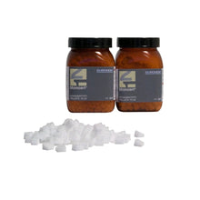 Euronda Monoart Schaumstoffpellets mit zwei Flaschen und weißen Schaumstoffstücken